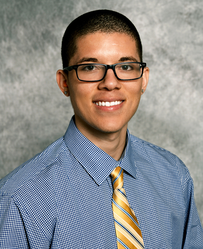 Portrait of Dr. Taylor Johnson, general dentist in Erie, PA, smiling in a professional headshot
